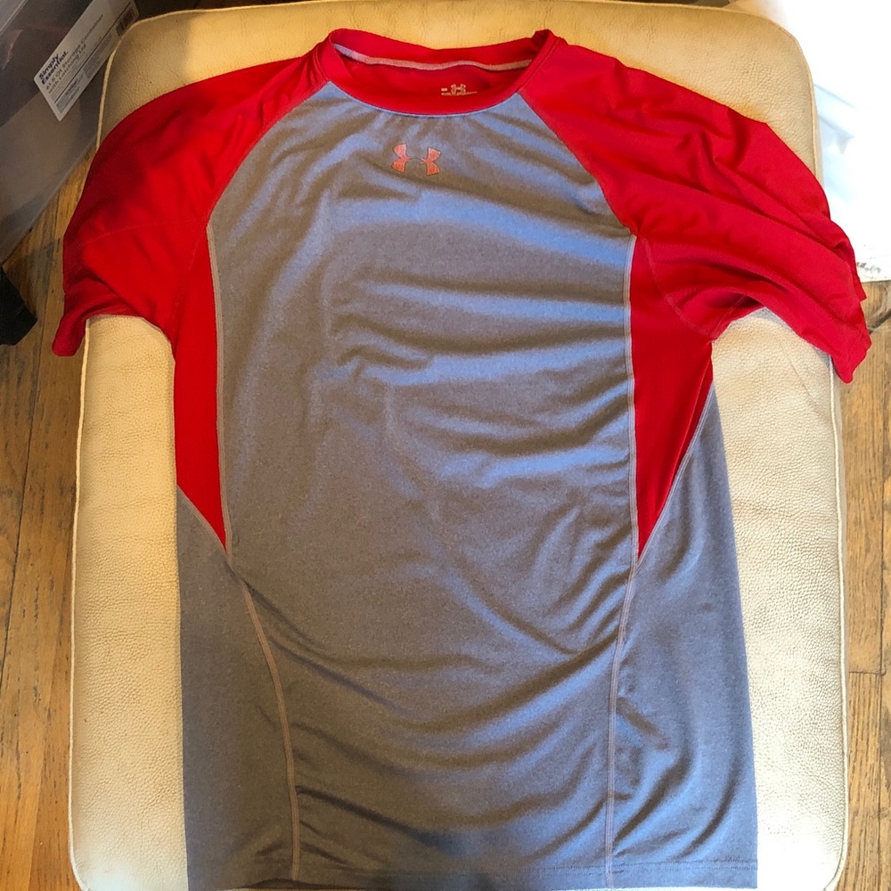 Under Amour men’s medium blue / red short-sleeve workout shirt.